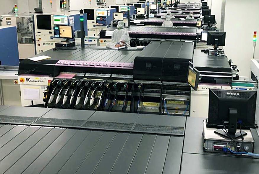 Precision test and inspection stations with cleanroom operators